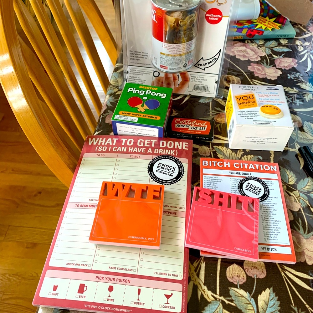 Novelty items/gifts.Post-it pads, games, as shown